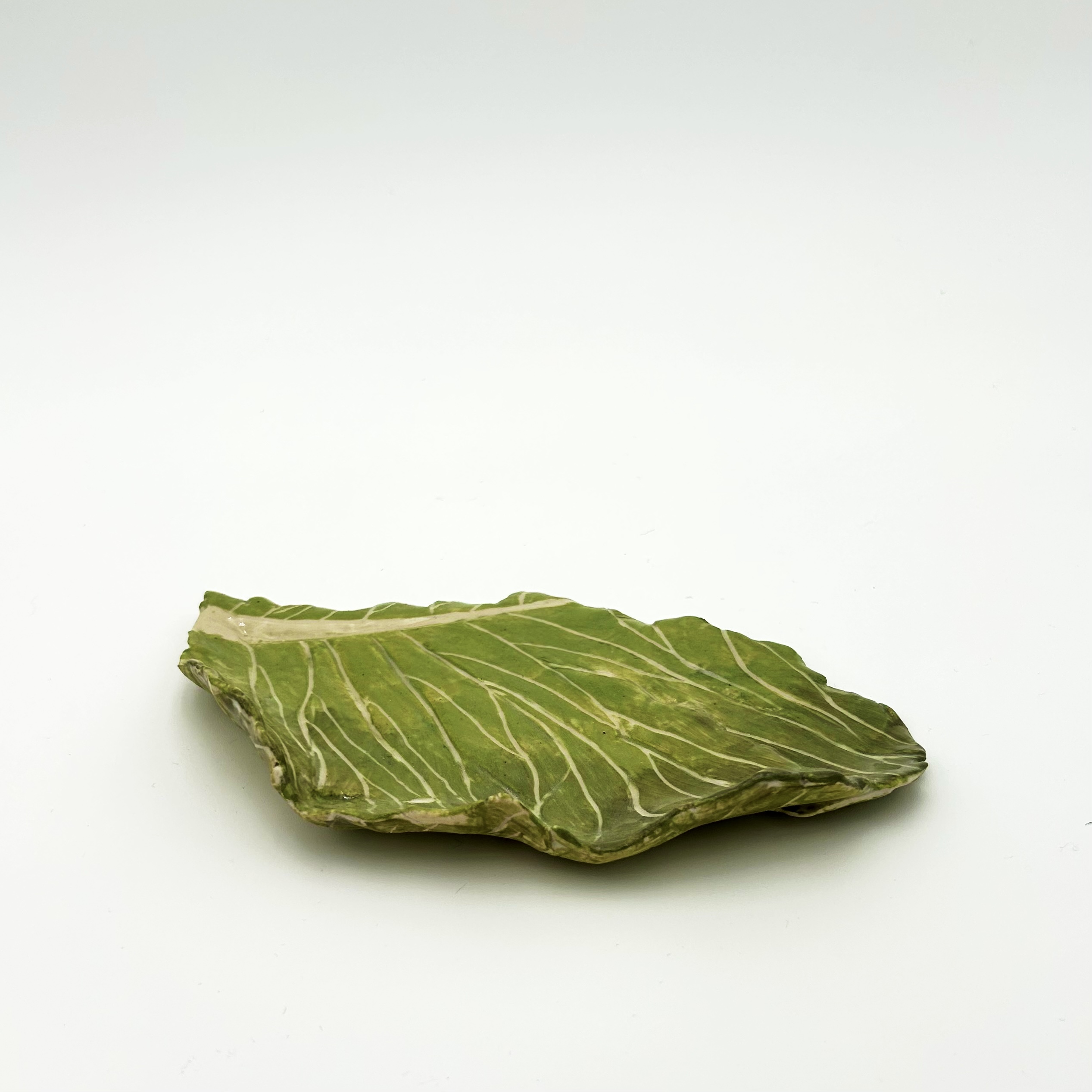 Half cabbage leaf spoon rest